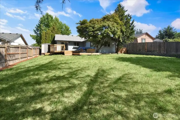 Huge back yard.  Perfect for play or gardening.