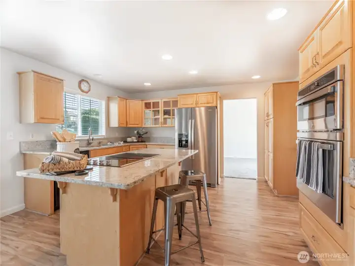 Eating bar with downdraft cooktop