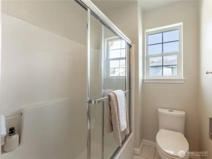Shower in hallway bath