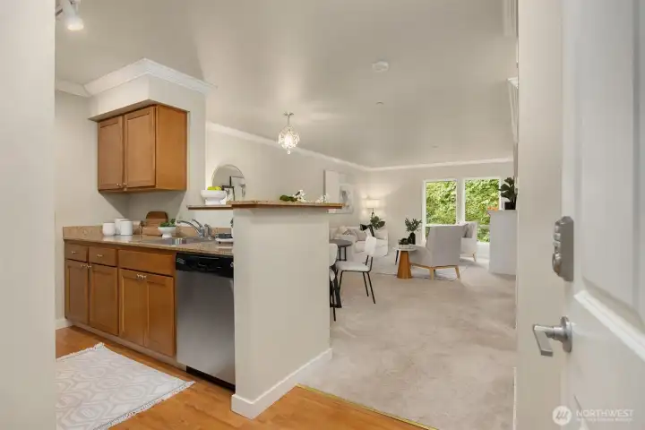 Enter into the open floor plan, contemporary condominium.