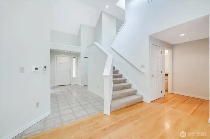 The stairs ascend to a loft and a guest bedroom featuring a full private bath.