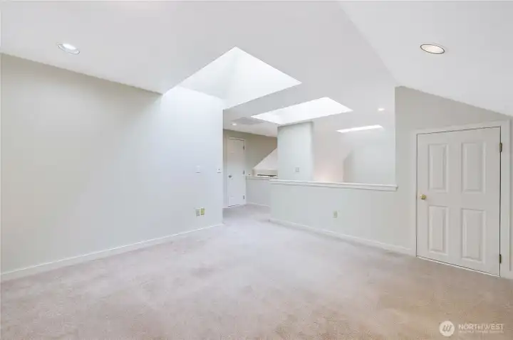 With fresh paint, skylights, intriguing architectural angles, and a spacious closet, this loft offers endless possibilities.