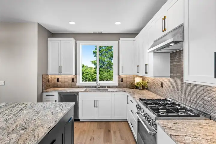 6 burner range is just one of the high end Bertazzoni appliances in this fabulous kitchen.