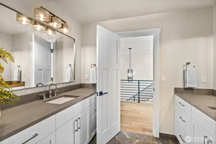 Main hall bath offers 2 separate 6 foot vanities.