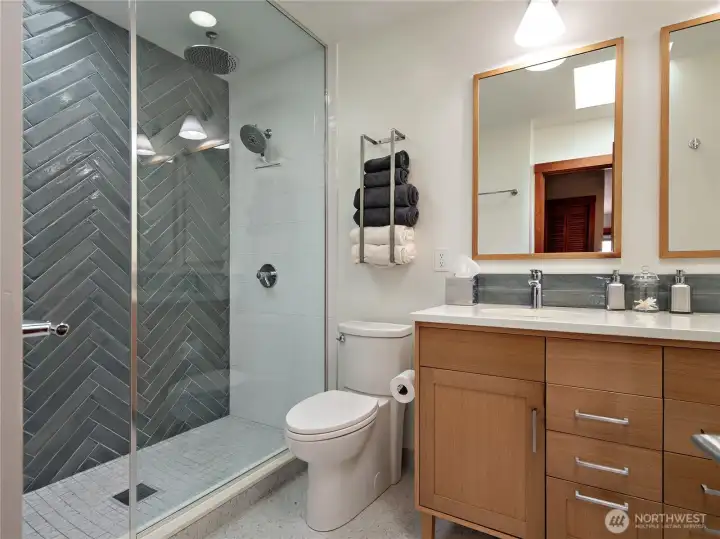 Fully updated 3/4 primary suite bathroom, with double sinks,