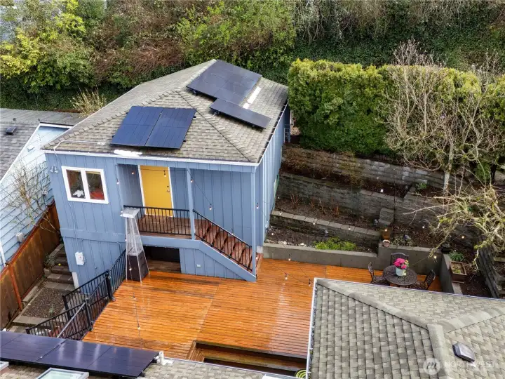 Another view of the back deck and garage.
