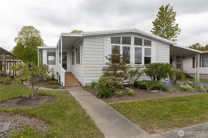 Welcome to life in a quiet gated 55+ community, Park Village.