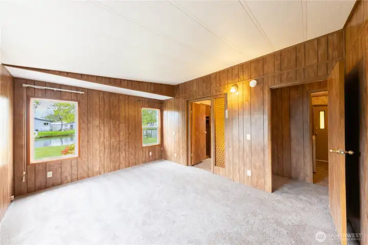 The large primary suite has an attached bathroom with a walk in closet.