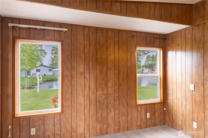 Enjoy the pond view from the primary suite.