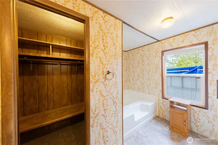 The walk in closet is set in the primary bathroom, leaving extra space in the bedroom.