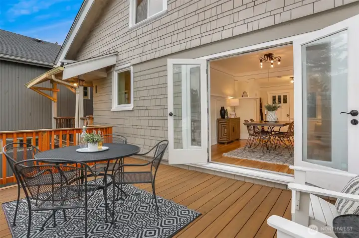 French doors open to the wrap around deck.