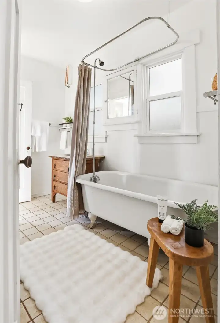 Unwind in this classic clawfoot tub—your perfect end-of-day treat!