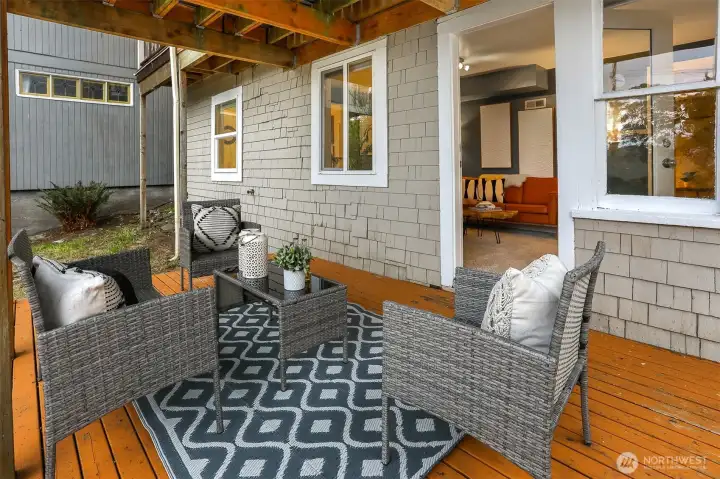 Deck adjacent to the lower level—an inviting outdoor extension of the living space.
