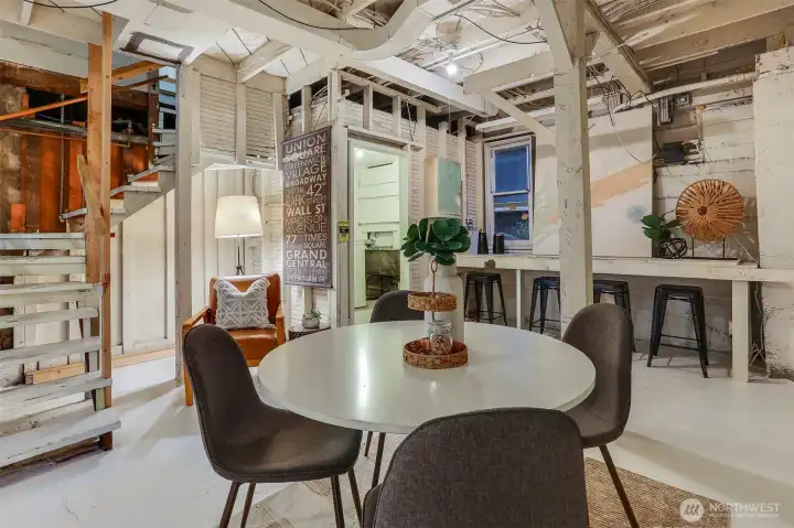 Second view of the soaring ceilings in the lower level—ready for your creative ideas to take shape.