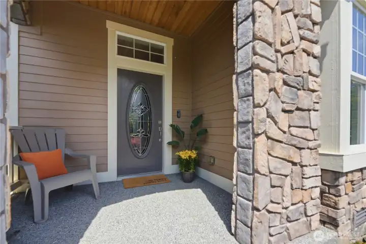 Welcoming covered front patio. Welcoming covered front patio.