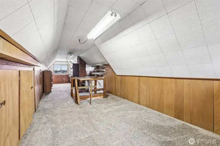 Upstairs attic. This could be used for storage or it definitely has the potential to be a gaming room, craft room, library, etc. The possibilities are endless
