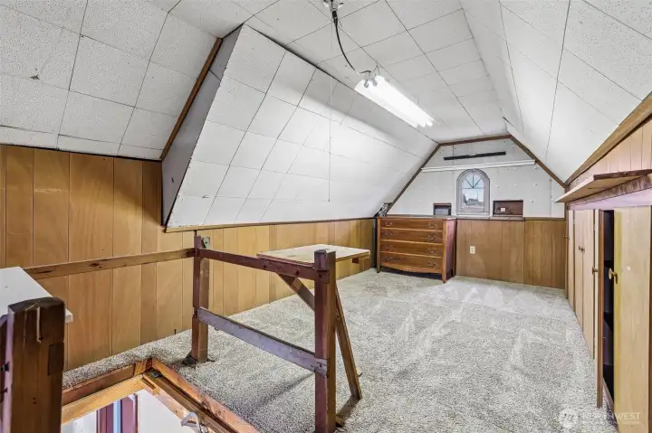 Other half of the attic. You can see the built-in storage on the right