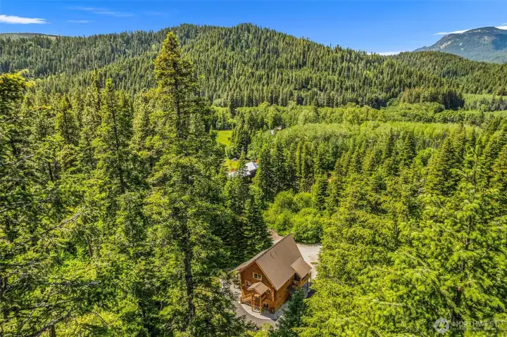 Aerial View of Home on Wooded Acreage