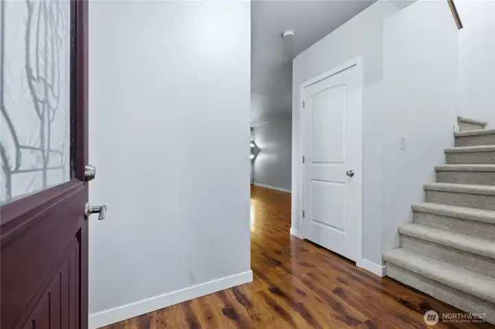The inviting entryway opens beautifully into the main level
