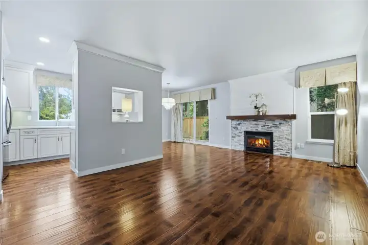 A beautifully connected main level seamlessly blending the living, dining, and kitchen spaces.