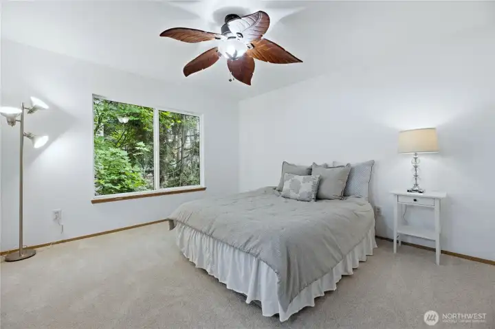 Spacious primary suite offering a peaceful, private retreat on the upper level.