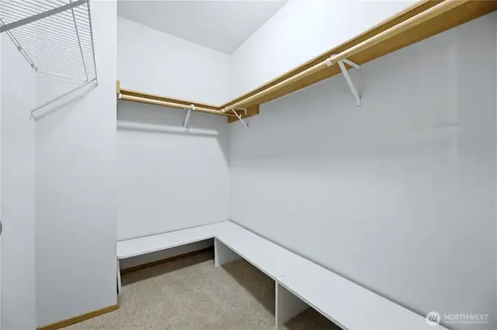 Impressive primary suite walk-in closet.
