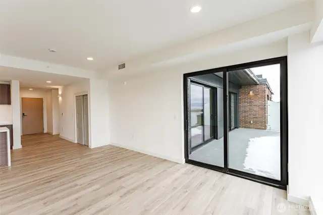 Living room looking out to unit deck.
