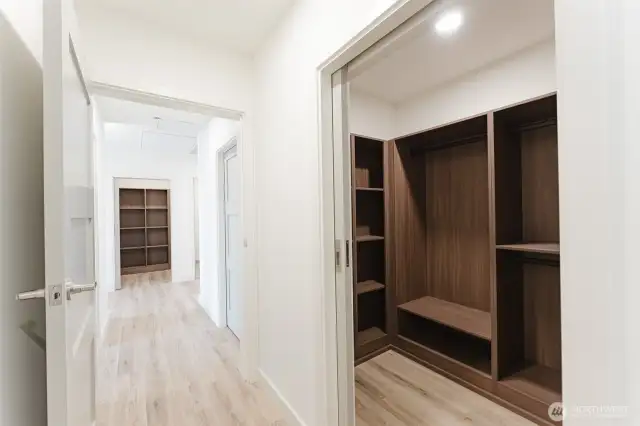 Entry to primary bedroom, primary walk-in closet to the right.
