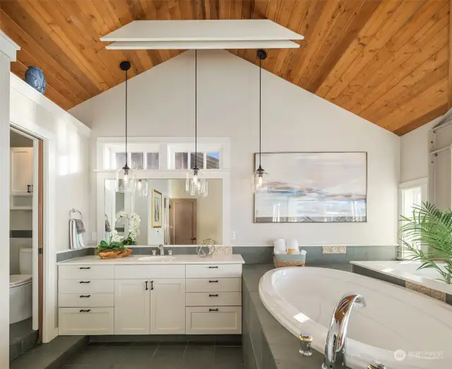 Spa bathroom with vibrant lines and natural finishes.