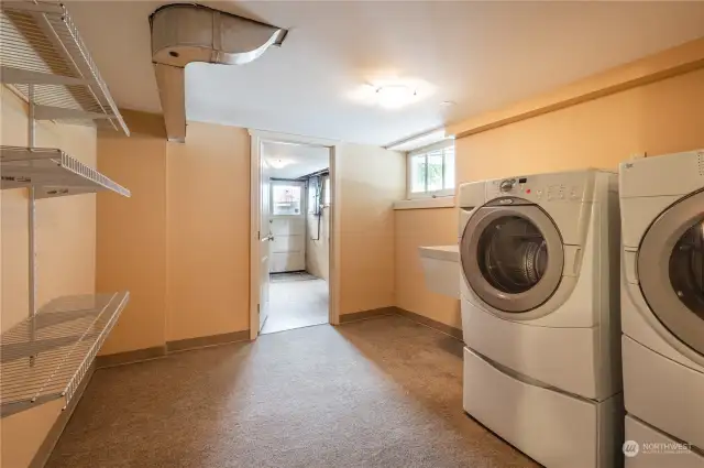 Laundry area and large attached utility room with outdoor access. MIL?