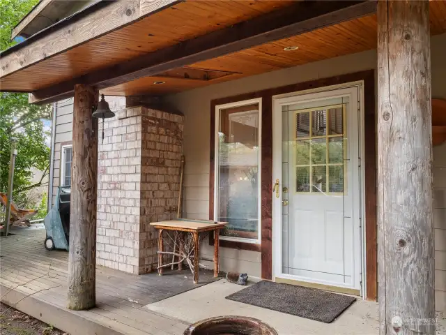 Covered front porch with recessed lights