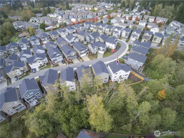Prime lot in Greenbrooke offers a rare large yard and greenbelt privacy.