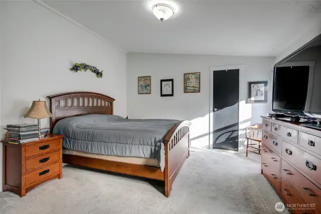 Primary suite is large with a walk in closet and private bathroom.