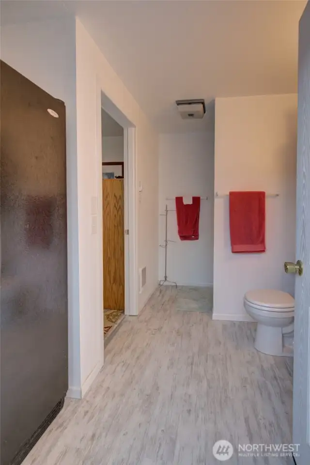 Walk along the side of the storage shed to access the ADU.  The RV hookups are just outside the ADU, so this could serve as casita to RV guests!
