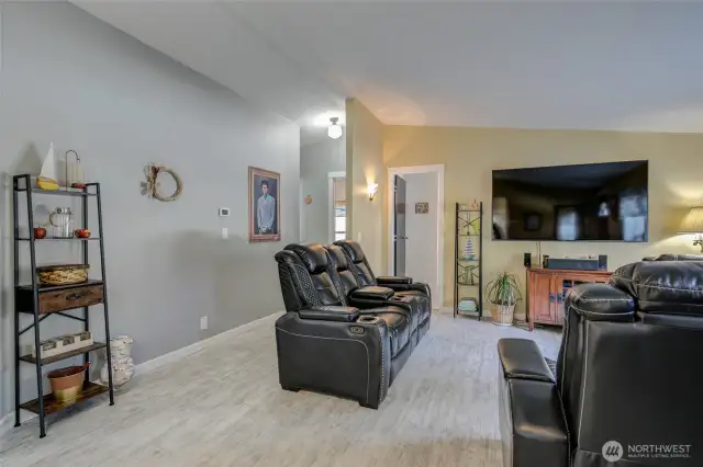 Stepping into the front door, we enter the living room.  Second and third bedrooms and main bath are to the right of the living room.