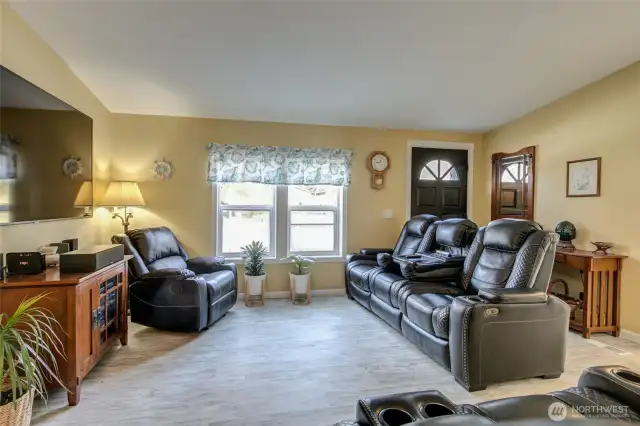 Home remodel included new flooring and new window blinds.