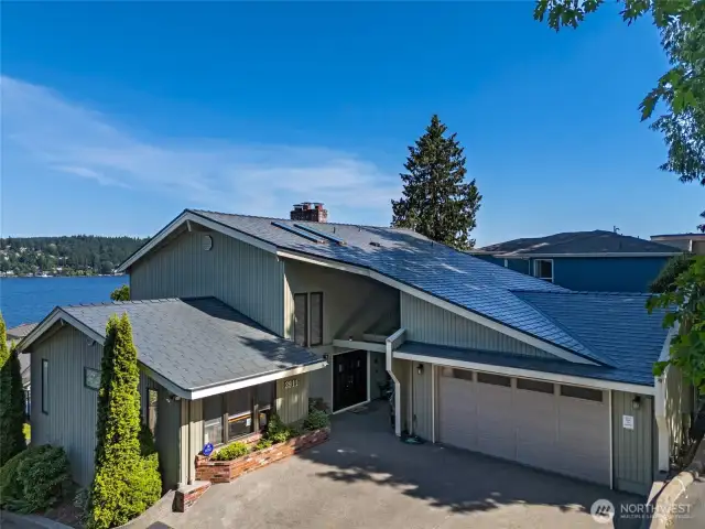 This stylish 4 bed 2.75 bath view home in the desirable Lake Forest Park neighborhood boasts an inviting light filled floor plan, designer touches, and spectacular panoramic lake, mountain, and territorial views from all levels.
