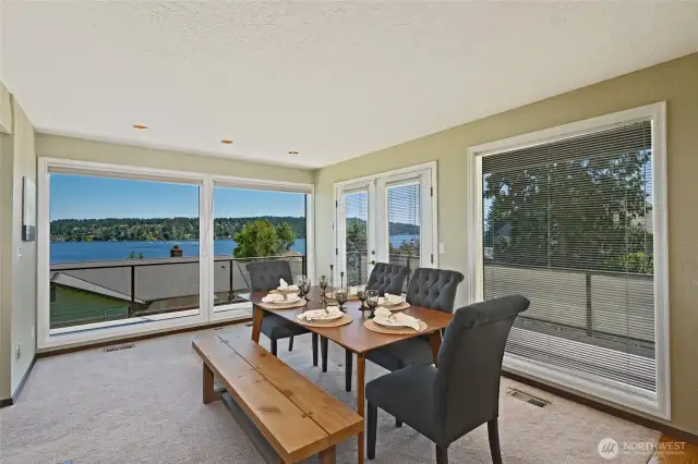 Sizeable dining room with access to wrap-around composite deck.