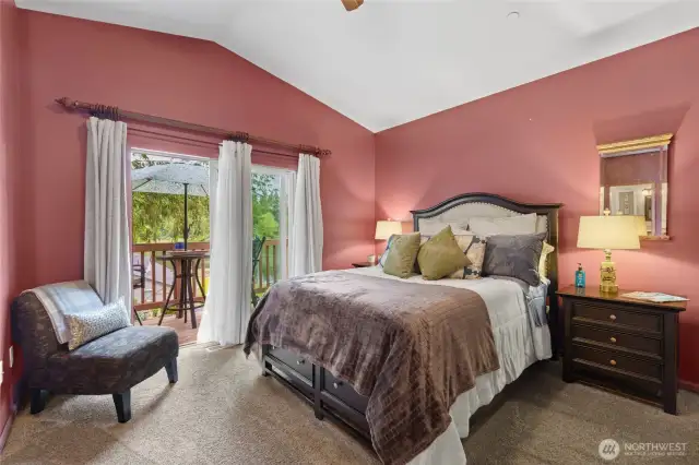 The primary bedroom has an attached bathroom.  You can wake up and stretch (or relax)  on you own private deck