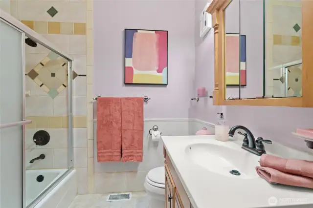 Full bath located just across from the second and third bedrooms