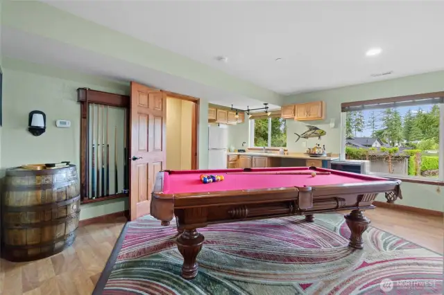 This fully finished daylight basement is large enough to accommodate a pool table and small kitchen unit.  Could be multi-gen living unit