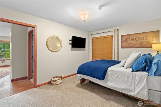 This bedroom completes the concept that the daylight basement could be a separate living area with it's own outside entrance.
