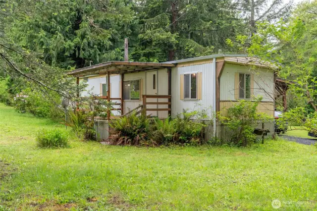 Mobile sits on back side of property.  Was consistently rented for $700 a month.