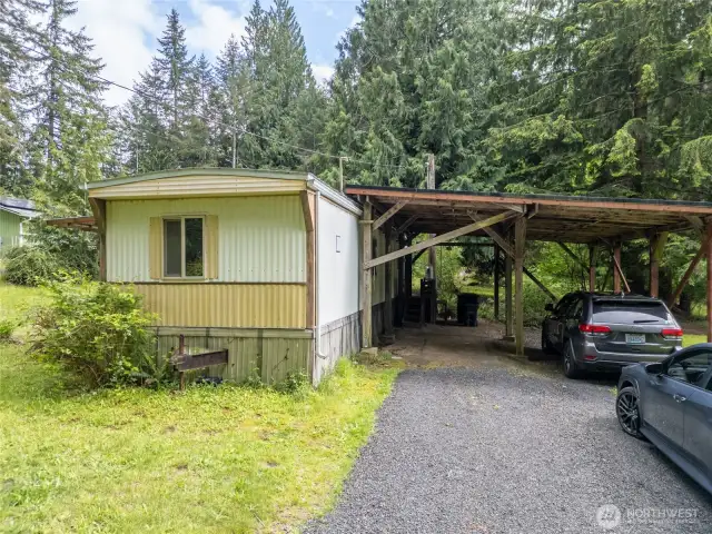 Newer 2 car carport off mobile.