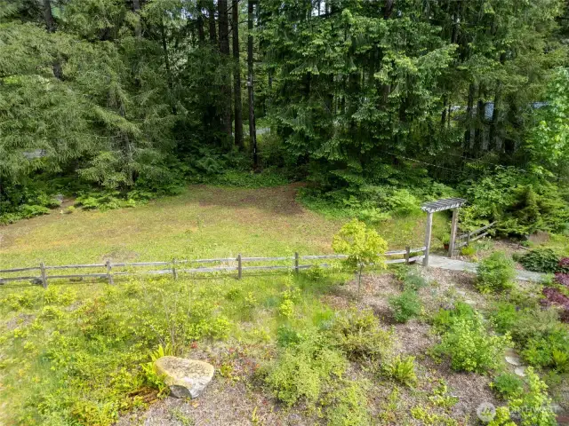 Overhead view of the front yard and garden space.