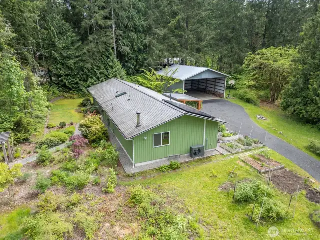 Drone photo from side of home showing pole barn location.