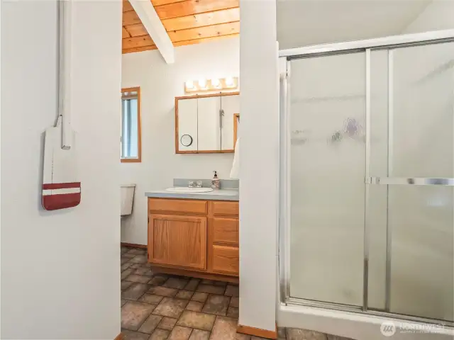 The adjoining bathroom has a washer/dryer hookup