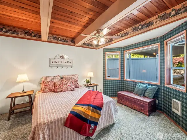 The main floor bathroom is conveniently located across from the bathroom - with ceiling detail as well