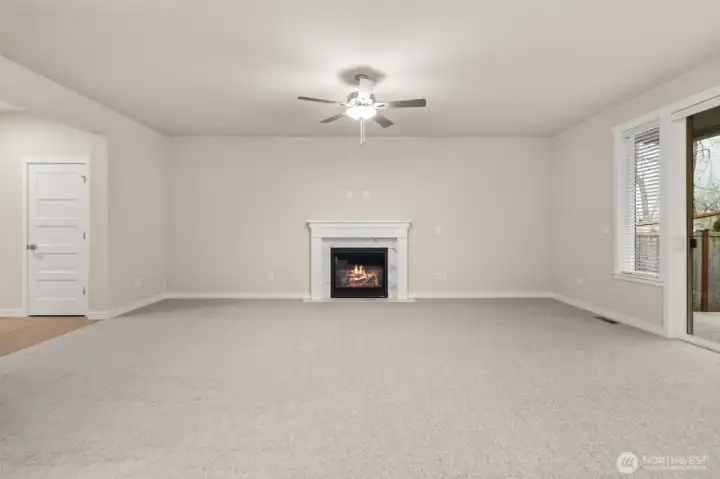 Great room features gas fireplace, for those cozy nights and a ceiling fan to keep you comfortable during the warmer months.