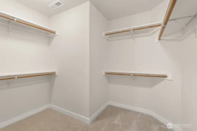 Large, walk-in closet in primary bedroom